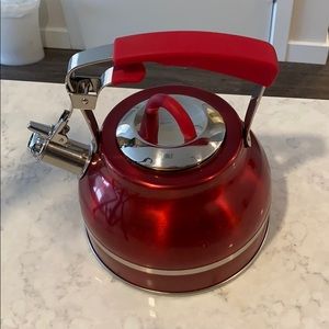 Secure whistling tea kettle
